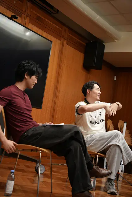 Arnold Hur and the moderator on stage at the Gen.G fireside chat